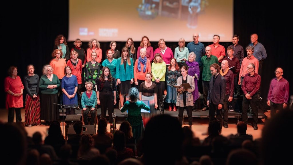 Wing-It Singers on stage at Voices That Wander concert, October 2024. Credit: Paul Gilbey